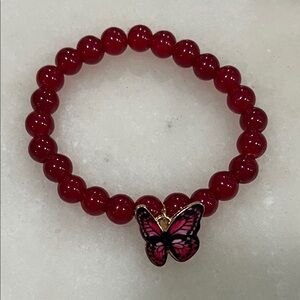 Crimson Beaded Bracelet with Pink Butterfly Charm